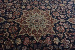 Central medallion detail of 1930s Kashan rug from Iran / Persia
