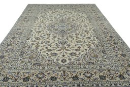Surface texture of 2000s Kashan rug with natural Wool and intricate pattern