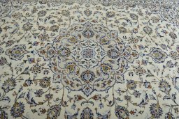 Central medallion detail of 2000s Kashan rug from Iran / Persia
