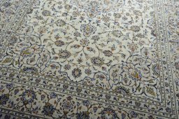 Close-up detail of 2000s Kashan rug from Iran / Persia showing Wool weave