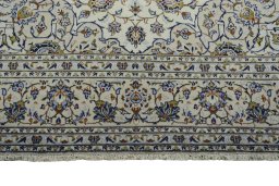 Full view of 2000s Kashan rug from Iran / Persia, 345 × 243 cm in Beige tones
