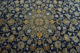 Central medallion detail of 2000s Kashan rug from Iran / Persia