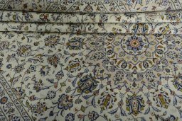 Close-up detail of New Kashan rug from Iran / Persia showing Wool weave