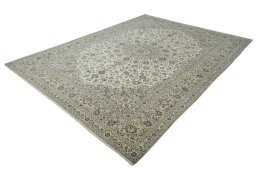 Corner detail of New Kashan rug showing border pattern and Wool pile