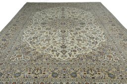 Surface texture of New Kashan rug with natural Wool and intricate pattern