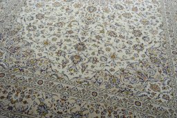 Close-up detail of New Kashan rug from Iran / Persia showing Wool weave