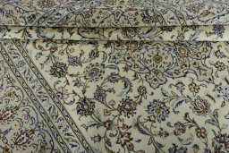 Close-up detail of 2000s Kashan rug from Iran / Persia showing Wool weave