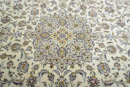 Central medallion detail of 2000s Kashan rug from Iran / Persia
