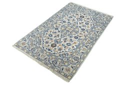 Corner detail of New Kashan rug showing border pattern and Wool pile
