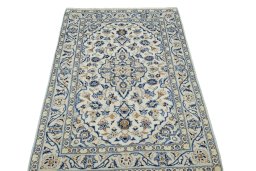 Surface texture of New Kashan rug with natural Wool and intricate pattern