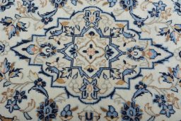 Central medallion detail of New Kashan rug from Iran / Persia