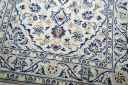Close-up detail of New Kashan rug from Iran / Persia showing Wool weave