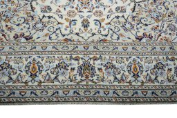 Close-up detail of 2000s Kashan rug from Iran / Persia showing Wool weave