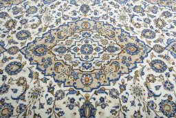 Central medallion detail of 2000s Kashan rug from Iran / Persia
