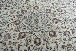 Central medallion detail of 2000s Kashan rug from Iran / Persia