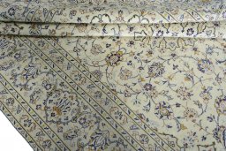 Close-up detail of 2000s Kashan rug from Iran / Persia showing Wool weave
