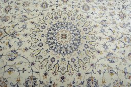 Central medallion detail of 2000s Kashan rug from Iran / Persia