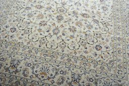 Close-up detail of 2000s Kashan rug from Iran / Persia showing Wool weave