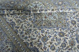 Close-up detail of 2000s Kashan rug from Iran / Persia showing Wool weave