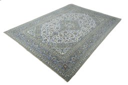 Corner detail of 2000s Kashan rug showing border pattern and Wool pile