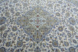 Central medallion detail of 2000s Kashan rug from Iran / Persia