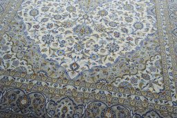 Close-up detail of 2000s Kashan rug from Iran / Persia showing Wool weave