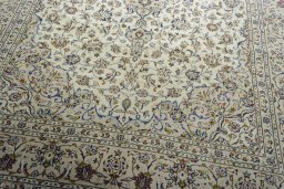 Close-up detail of 2000s Kashan rug from Iran / Persia showing Wool weave