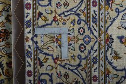 Central medallion detail of New Kashan rug from Iran / Persia