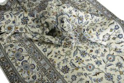 Surface texture of New Kashan rug with natural Cork and intricate pattern