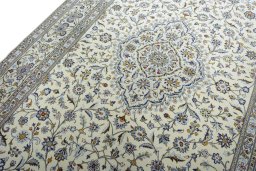 Backside of handmade New Kashan rug showing knot structure and weave density