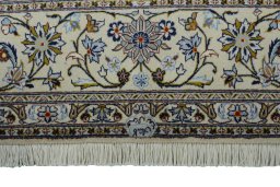 Full view of New Kashan rug from Iran / Persia, 296 × 205 cm in Beige tones