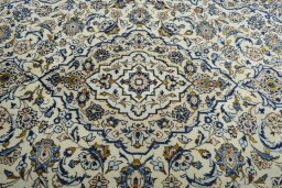 Central medallion detail of 2000s Kashan rug from Iran / Persia