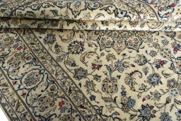 Close-up detail of 2000s Kashan rug from Iran / Persia showing Wool weave