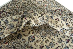 Surface texture of 2000s Kashan rug with natural Wool and intricate pattern