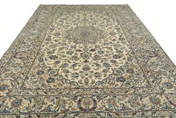 Surface texture of 2000s Kashan rug with natural Wool and intricate pattern