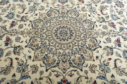 Central medallion detail of 2000s Kashan rug from Iran / Persia