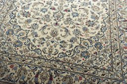 Close-up detail of 2000s Kashan rug from Iran / Persia showing Wool weave