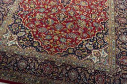Close-up detail of 2000s Kashan rug from Iran / Persia showing Cork weave