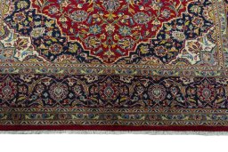 Full view of 2000s Kashan rug from Iran / Persia, 316 × 211 cm in Red tones