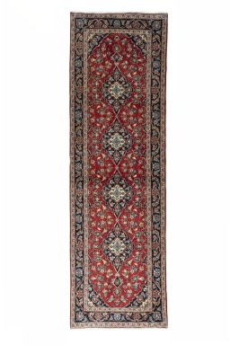 Full view of 2000s Kashan rug from Iran / Persia, 312 × 95 cm in Red tones