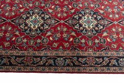 Close-up detail of 2000s Kashan rug from Iran / Persia showing Wool weave