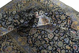 Close-up detail of New Kashan rug from Iran / Persia showing Cork weave