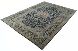 Corner detail of New Kashan rug showing border pattern and Cork pile
