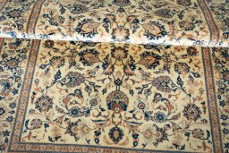 Close-up detail of 1970s Kashan rug from Iran / Persia showing Wool weave