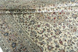 Close-up detail of 2000s Kashan rug from Iran / Persia showing Wool weave