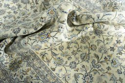 Surface texture of New Kashan rug with natural Cork and intricate pattern
