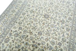 Backside of handmade New Kashan rug showing knot structure and weave density