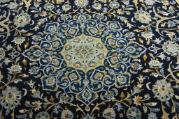 Central medallion detail of 2000s Kashan rug from Iran / Persia