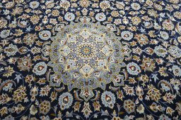Central medallion detail of 2000s Kashan rug from Iran / Persia