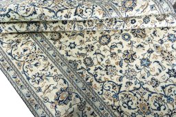 Close-up detail of 2000s Kashan rug from Iran / Persia showing Wool weave